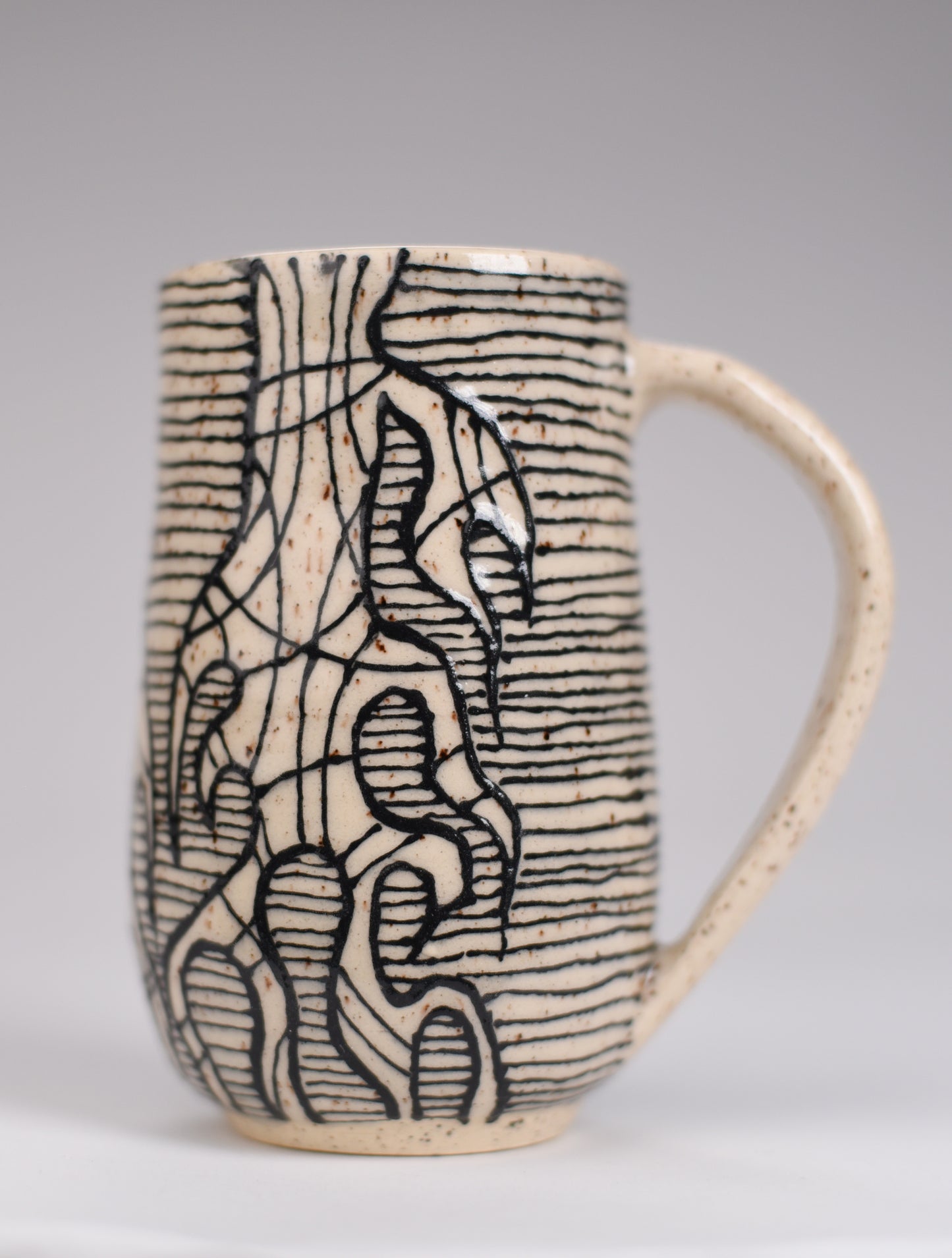 Roots mug 6/9