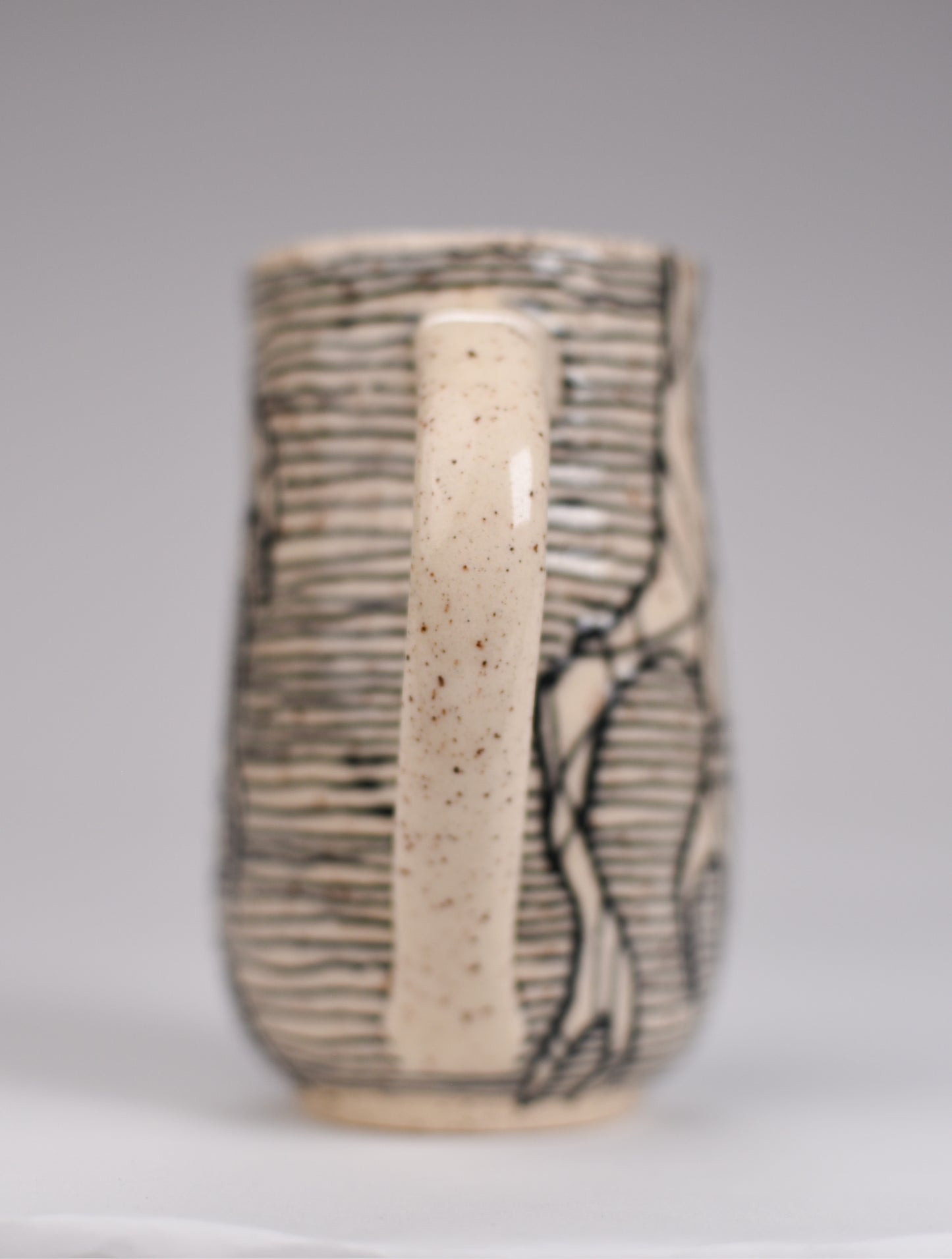 Roots mug 6/9